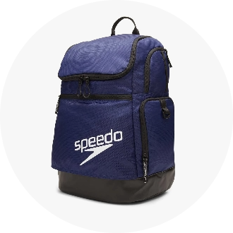 Blue athletic backpack with multiple zippered compartments, featuring the "speedo" logo on the front. Ideal for swimmers and gym-goers, offering ample storage and durability.