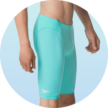 Man wearing turquoise swimming jammers. The swimwear features a snug fit and knee-length design, ideal for competitive swimming.