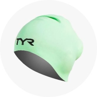 Light green swim cap with "TYR" logo, designed for competitive swimming. Durable and comfortable fit for all head sizes.