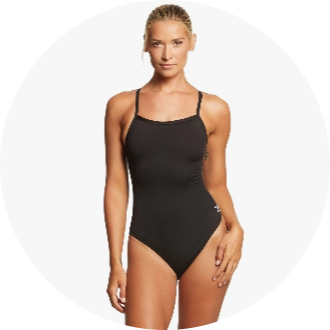 Woman wearing a black one-piece swimsuit with thin straps. The swimsuit is designed for competitive swimming and provides a sleek, athletic fit.